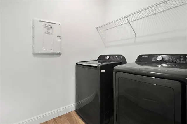 a utility room with dryer and washer