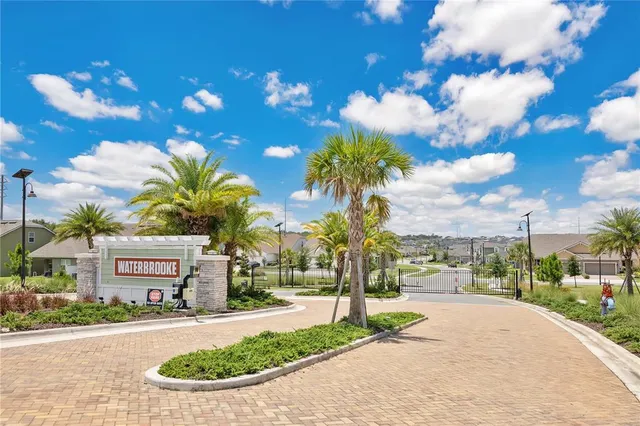 a view of a street with a building in the background