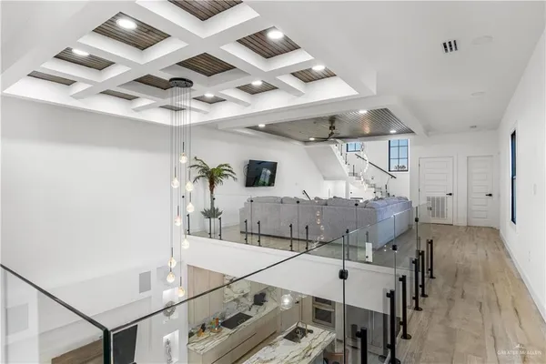 a view of a livingroom with furniture and wooden floor