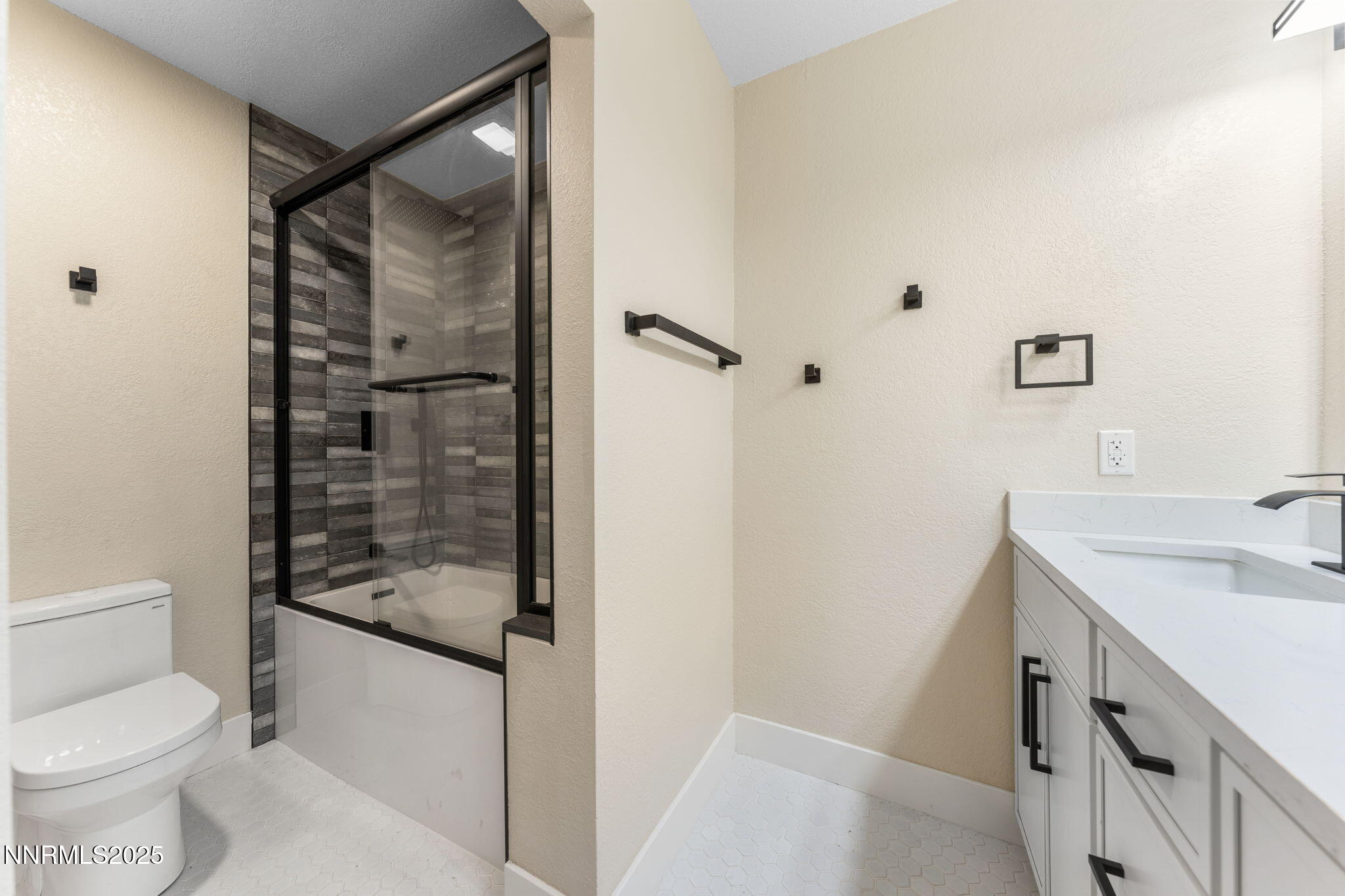 221 Lark Court, Unit 2 Incline Village, NV 89451 - Photo 11 of 33 a bathroom with a sink a toilet and shower