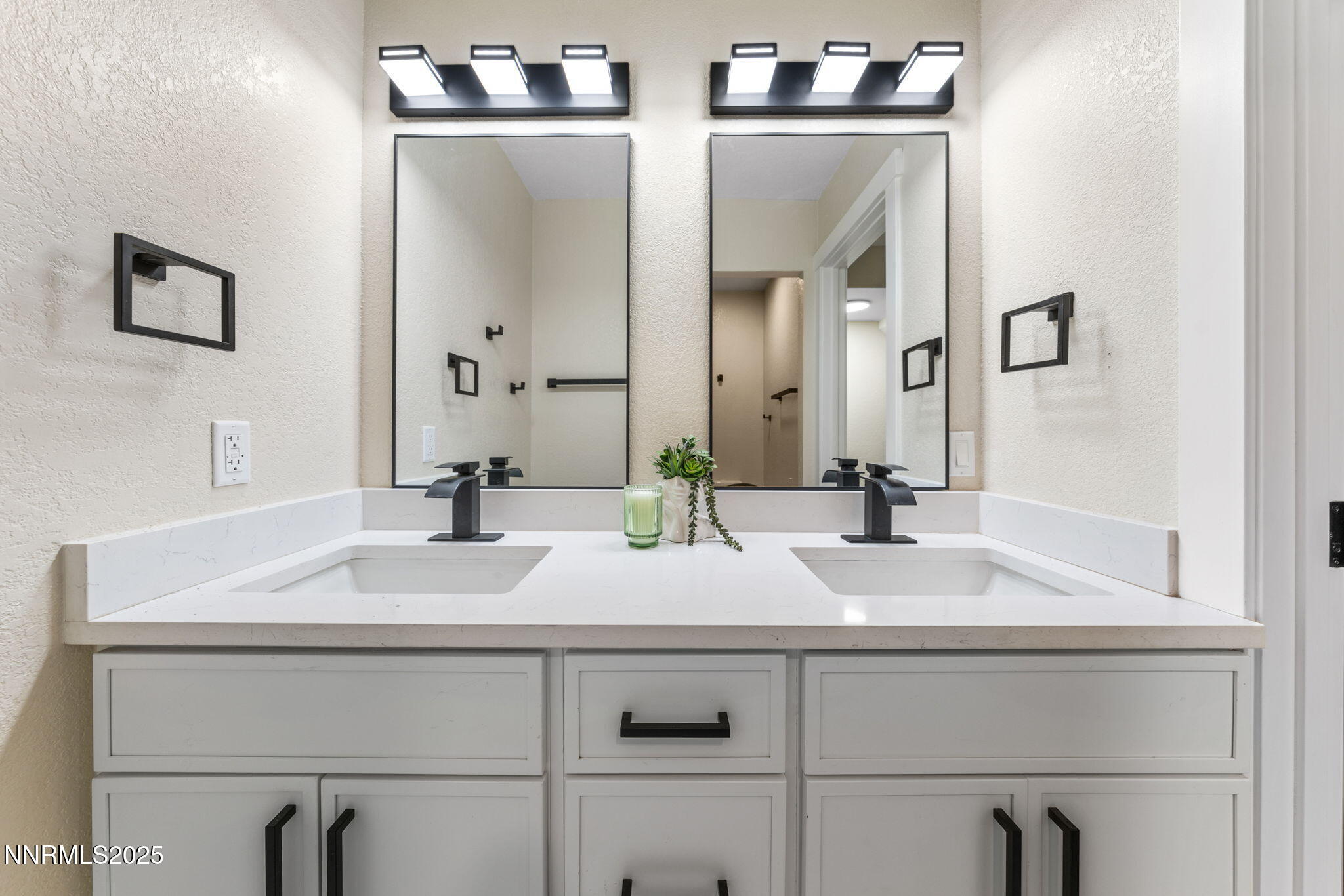 221 Lark Court, Unit 2 Incline Village, NV 89451 - Photo 12 of 33 a bathroom with double vanity sink and a mirror