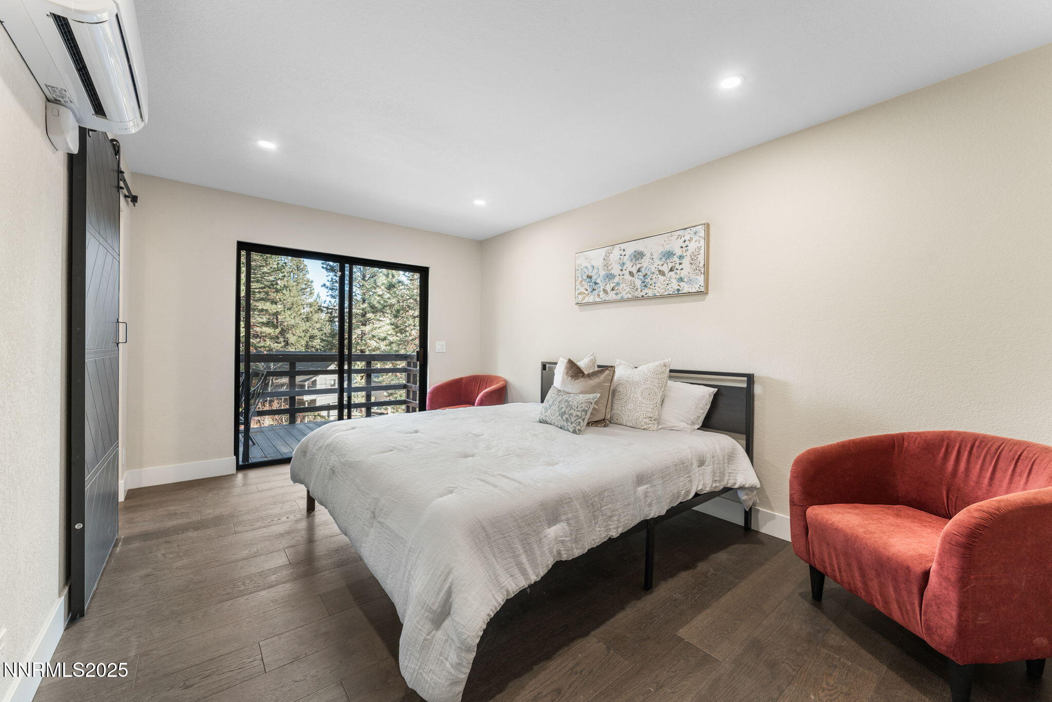 221 Lark Court, Unit 2 Incline Village, NV 89451 - Photo 14 of 33 a bedroom with a bed window and couch