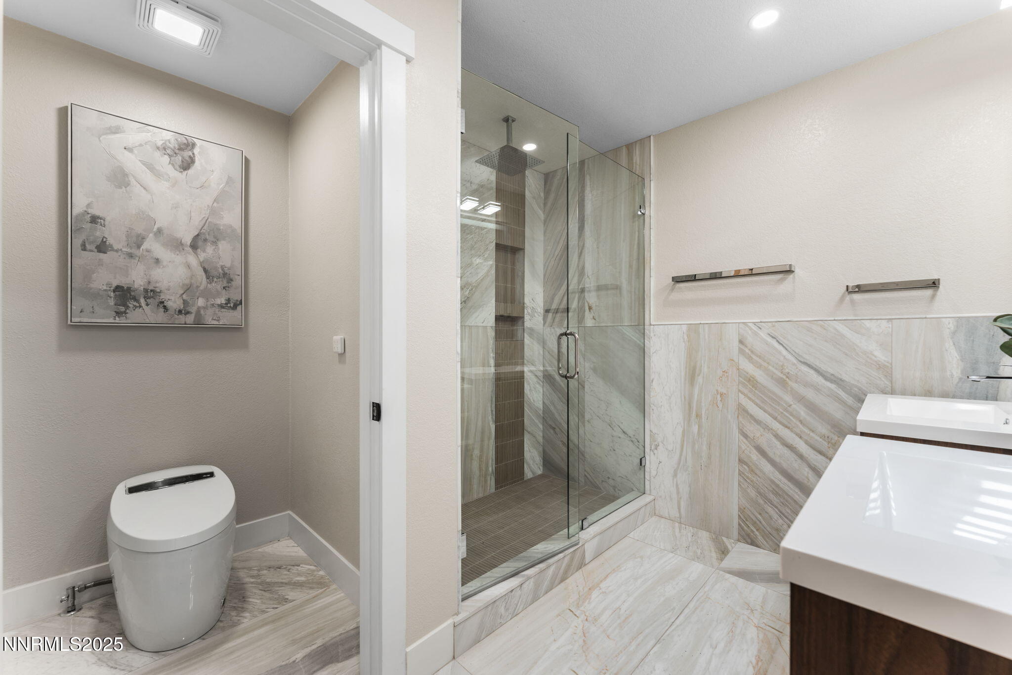 221 Lark Court, Unit 2 Incline Village, NV 89451 - Photo 17 of 33 a bathroom with a toilet sink and shower