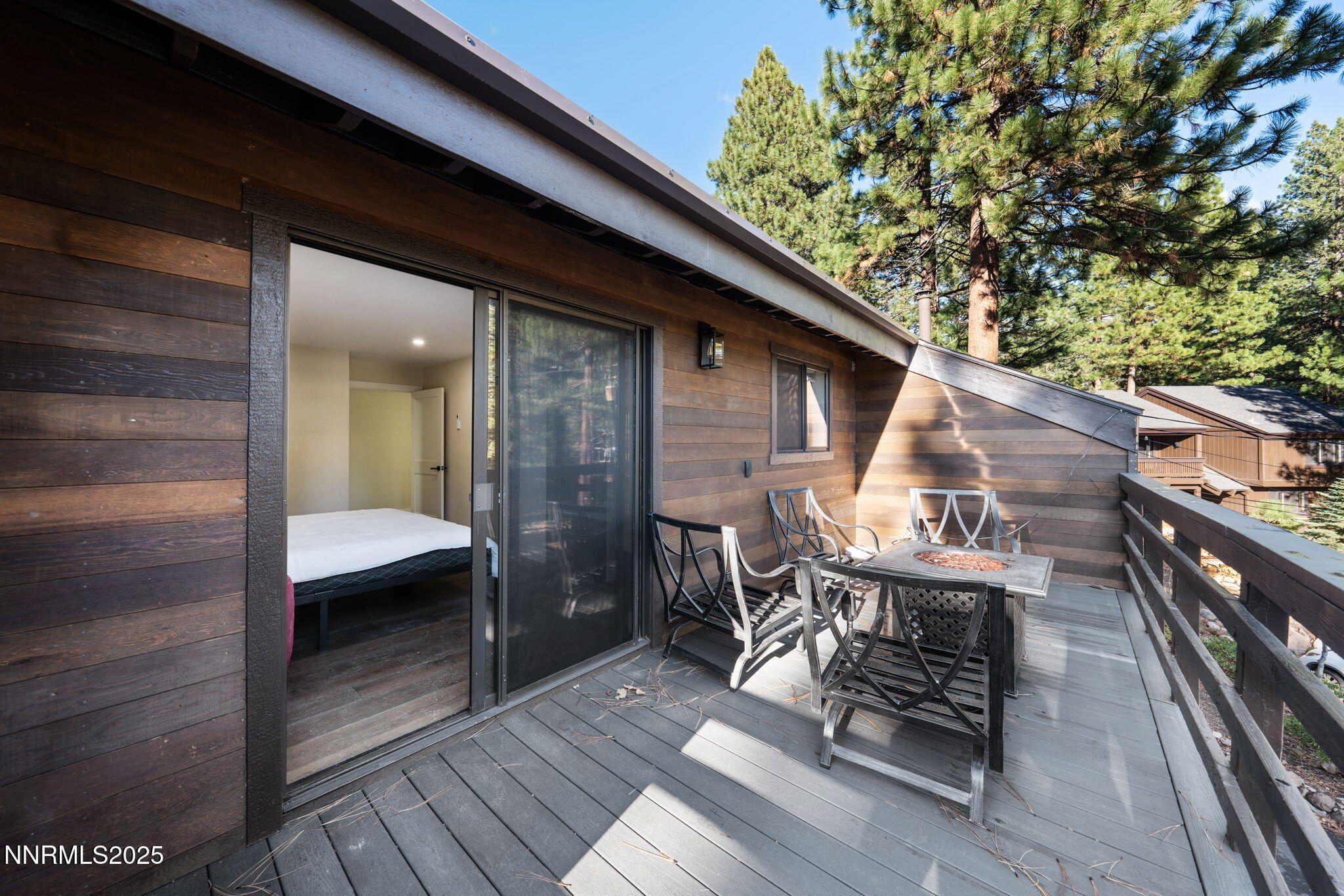 221 Lark Court, Unit 2 Incline Village, NV 89451 - Photo 26 of 33 a balcony with wooden floor and furniture
