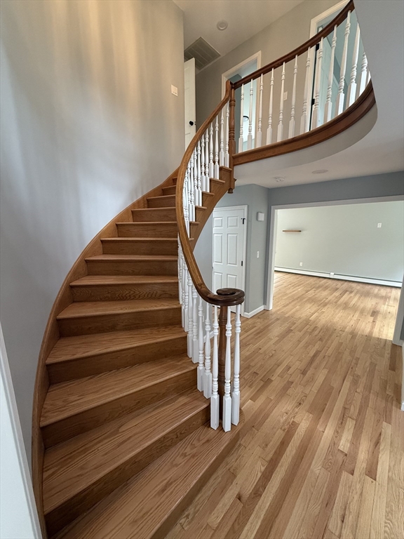 295 Frenchtown Road East Greenwich, RI 02818 - Photo 2 of 26 a view of entryway with wooden floor and a front door