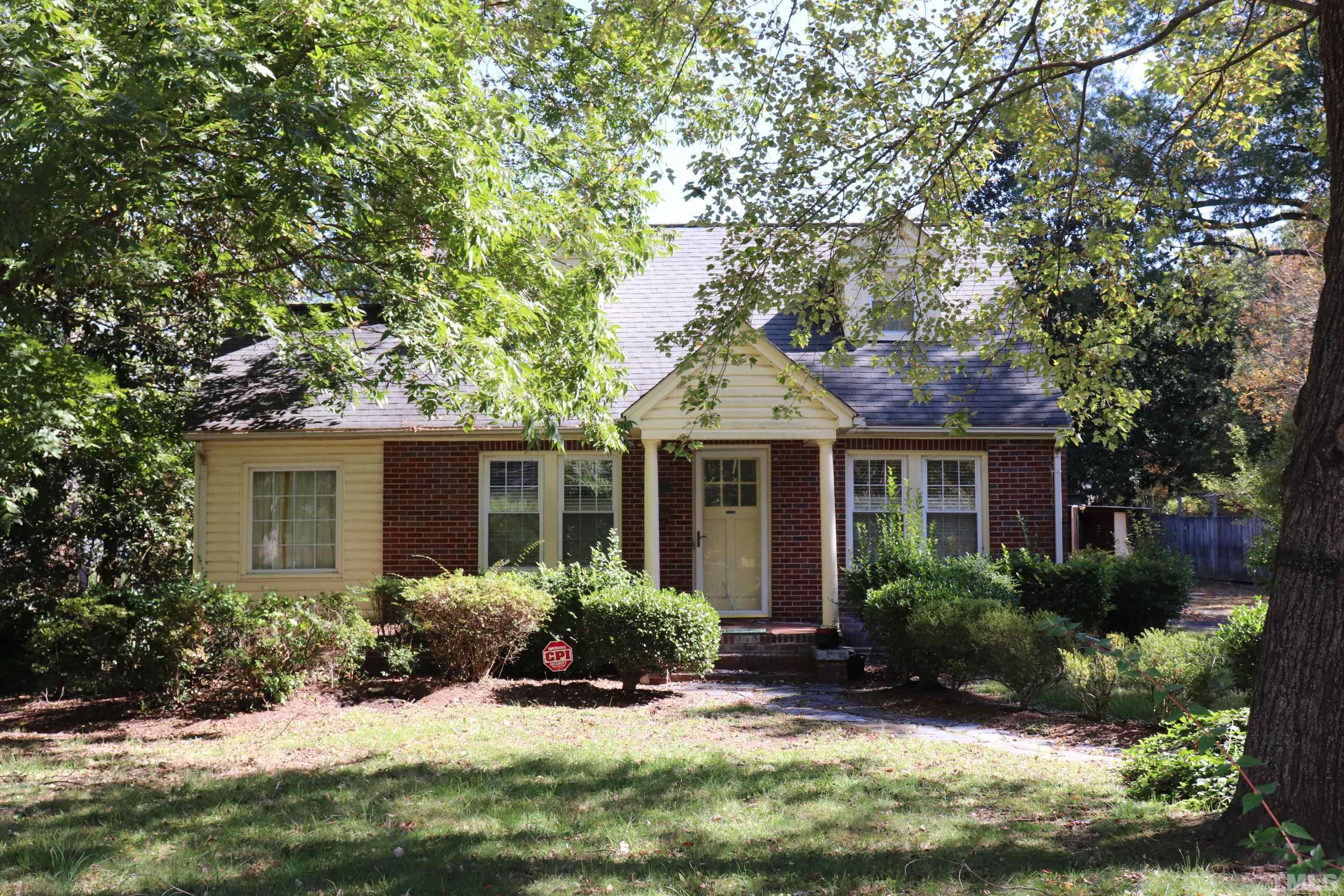 3103 Dixon Road Durham, NC 27707 - Photo 1 of 6 a front view of a house with a yard