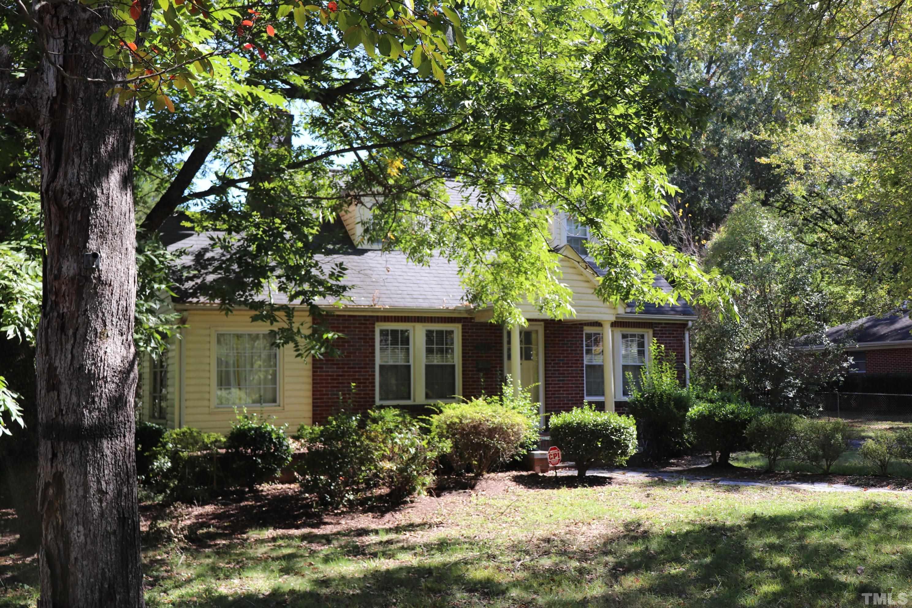 3103 Dixon Road Durham, NC 27707 - Photo 2 of 6 front view of a house with a yard