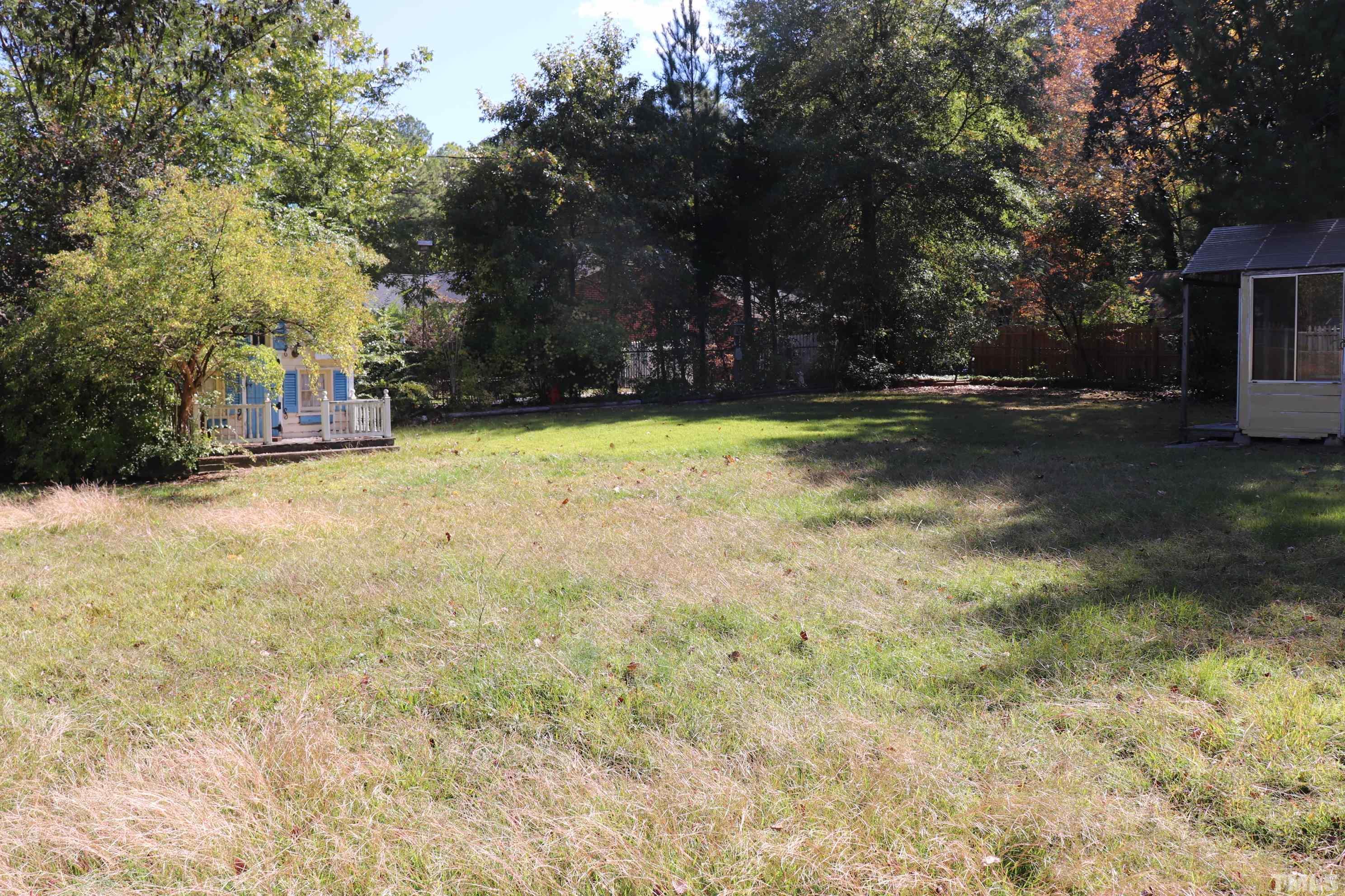 3103 Dixon Road Durham, NC 27707 - Photo 6 of 6 a view of a yard with trees
