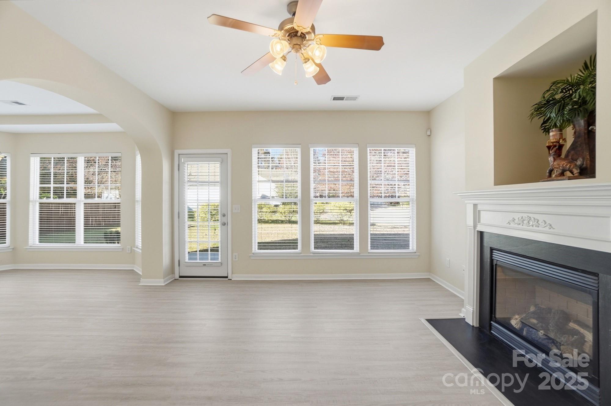 224 Sand Paver Way Fort Mill, SC 29708 - Photo 2 of 42 a view of an empty room with window and fire place
