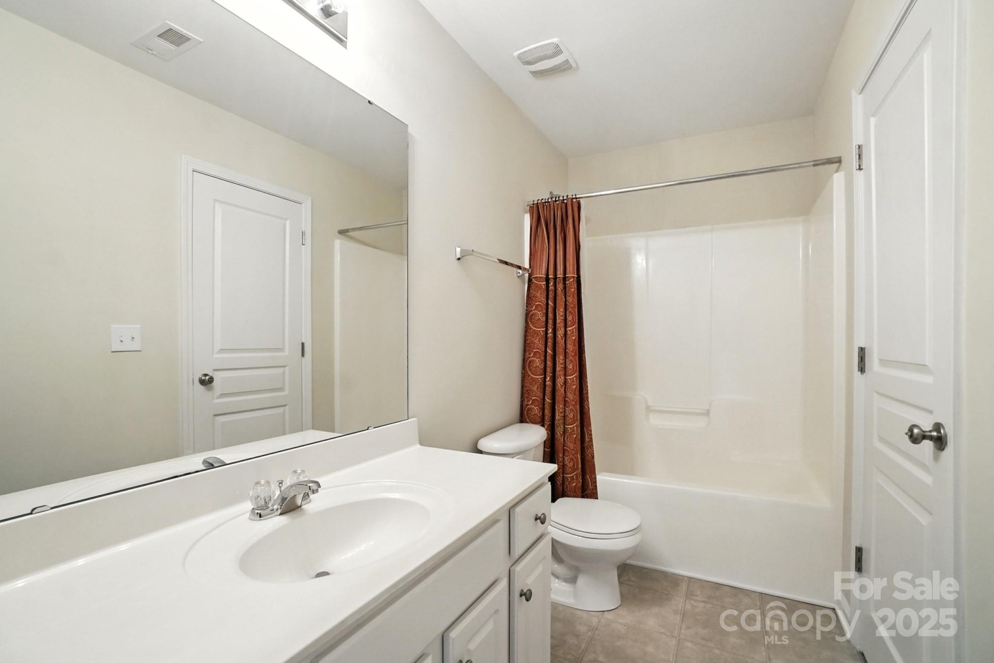 224 Sand Paver Way Fort Mill, SC 29708 - Photo 28 of 42 a bathroom with a sink toilet and shower