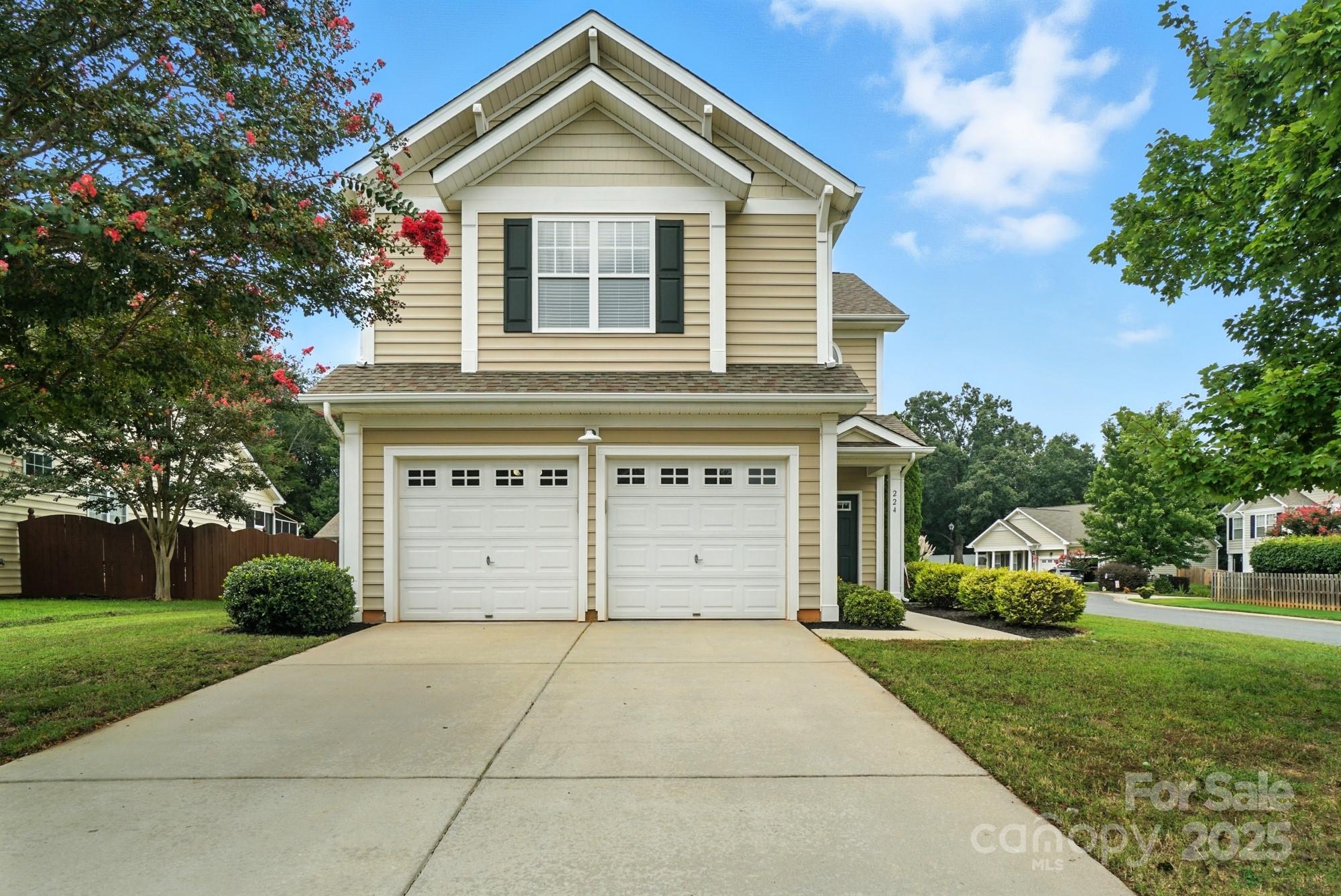 224 Sand Paver Way Fort Mill, SC 29708 - Photo 33 of 42 a front view of a house with a yard and garage