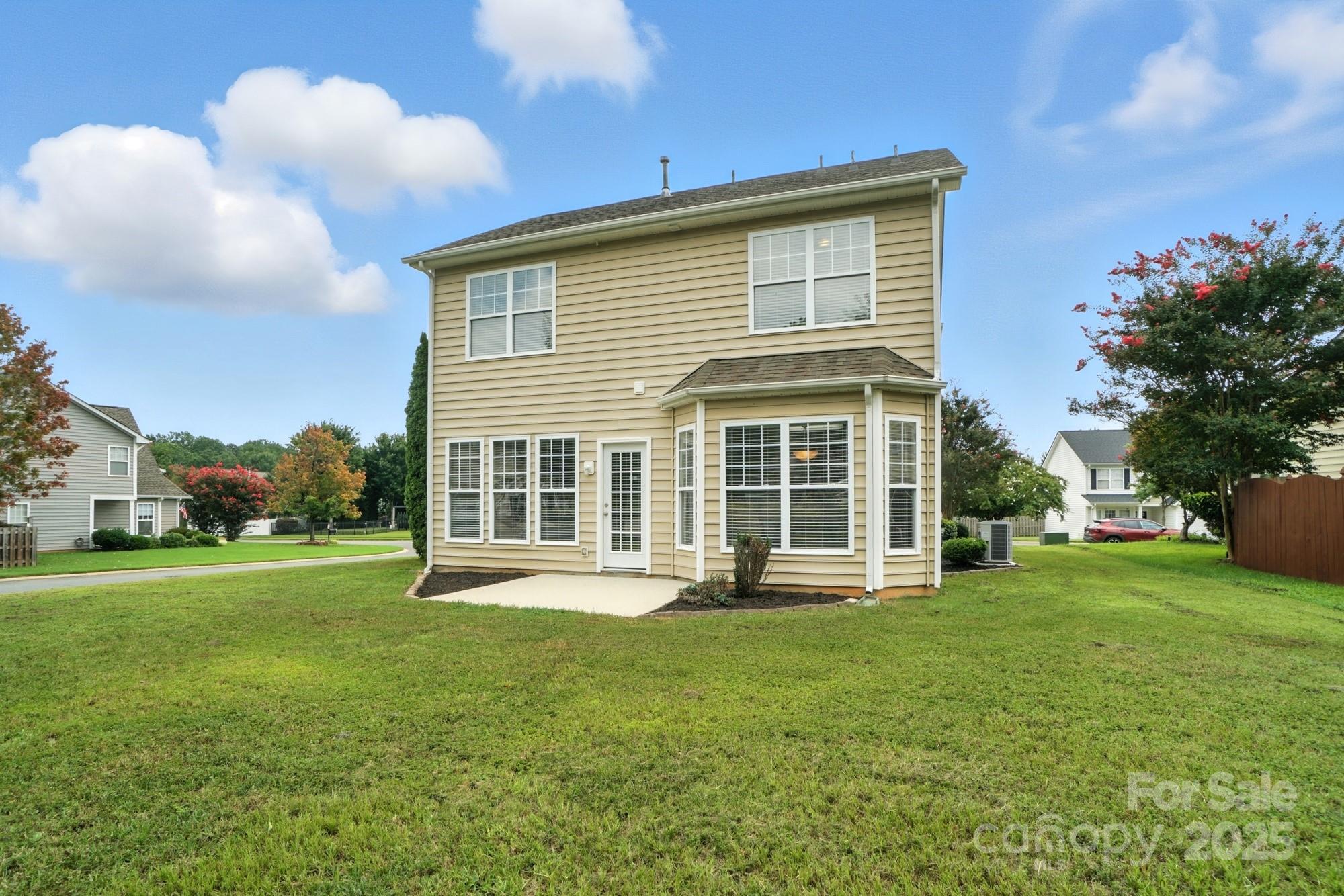 224 Sand Paver Way Fort Mill, SC 29708 - Photo 37 of 42 a front view of a house with a yard and trees