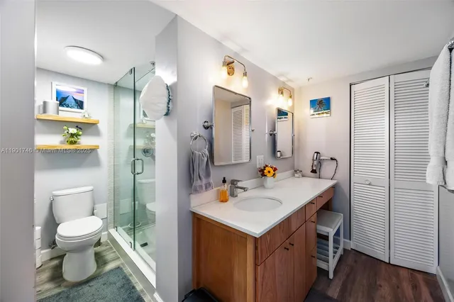 a living room with furniture and a book shelf