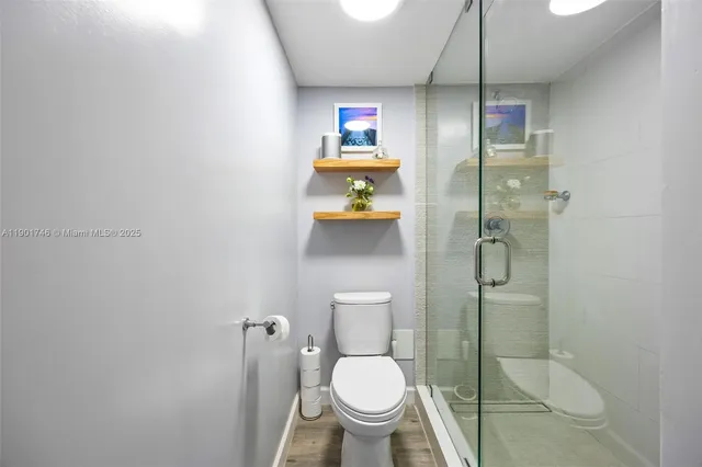 a bed room with a bed and a window