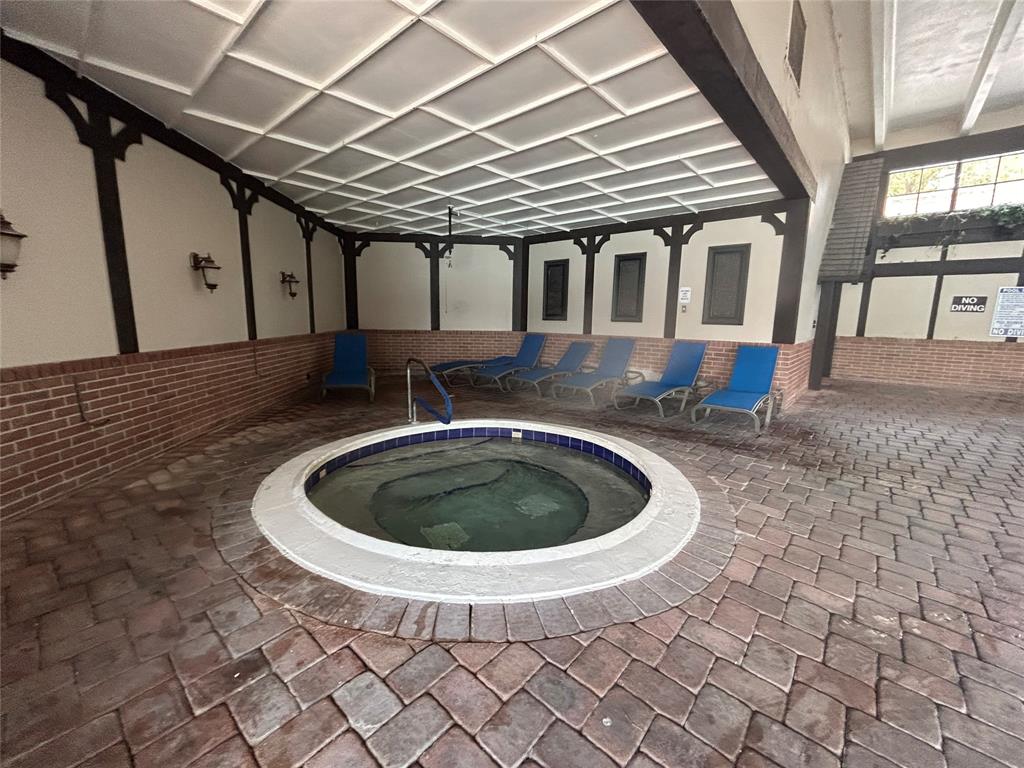 3710 Inverrary Drive, Unit 1Y Lauderhill, FL 33319 - Photo 16 of 17 a view of a indoor swimming pool