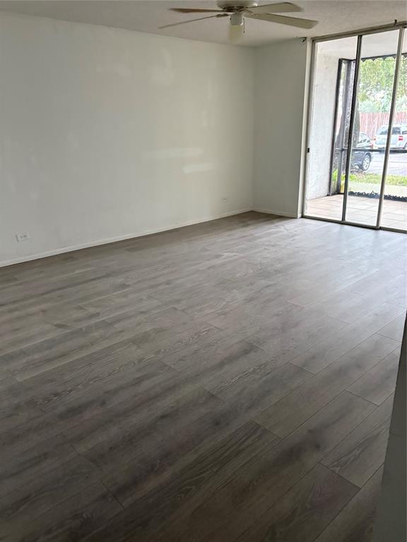 3710 Inverrary Drive, Unit 1Y Lauderhill, FL 33319 - Photo 2 of 17 a view of an empty room with a window