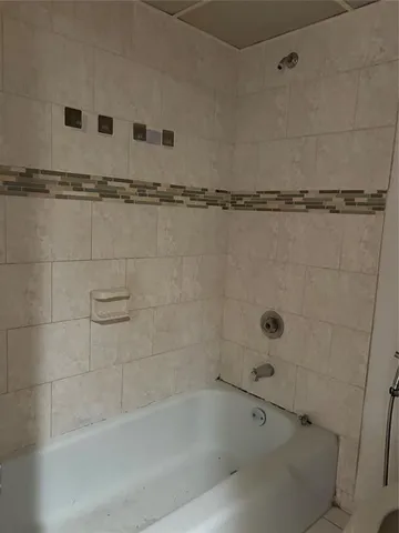 a close view of a bathtub in bathroom