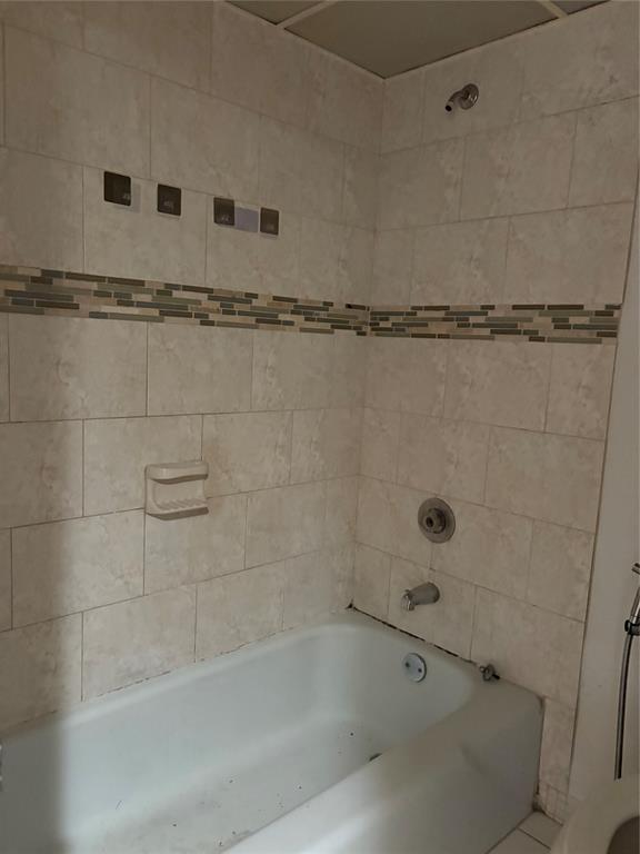 3710 Inverrary Drive, Unit 1Y Lauderhill, FL 33319 - Photo 9 of 17 a close view of a bathtub in bathroom