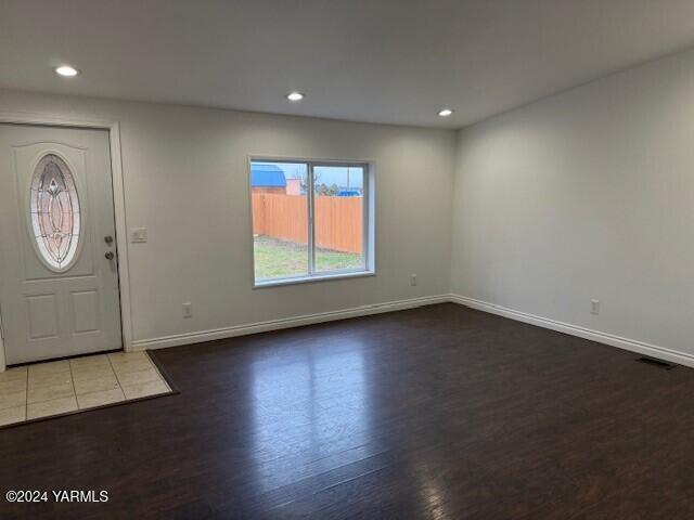 290 Outlook Road Outlook, WA 98938 - Photo 3 of 11 an empty room with wooden floor and windows