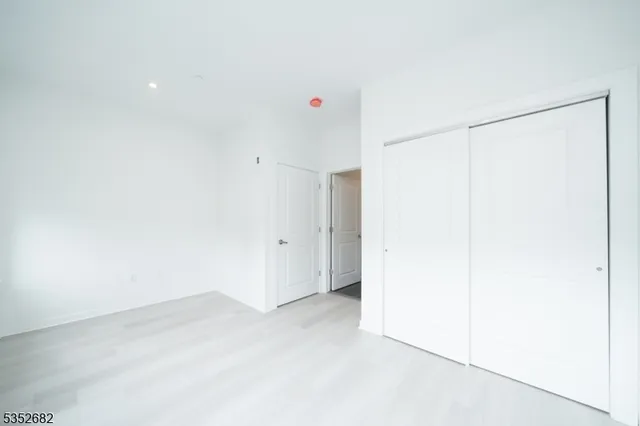 a very nice looking room with a ceiling fan