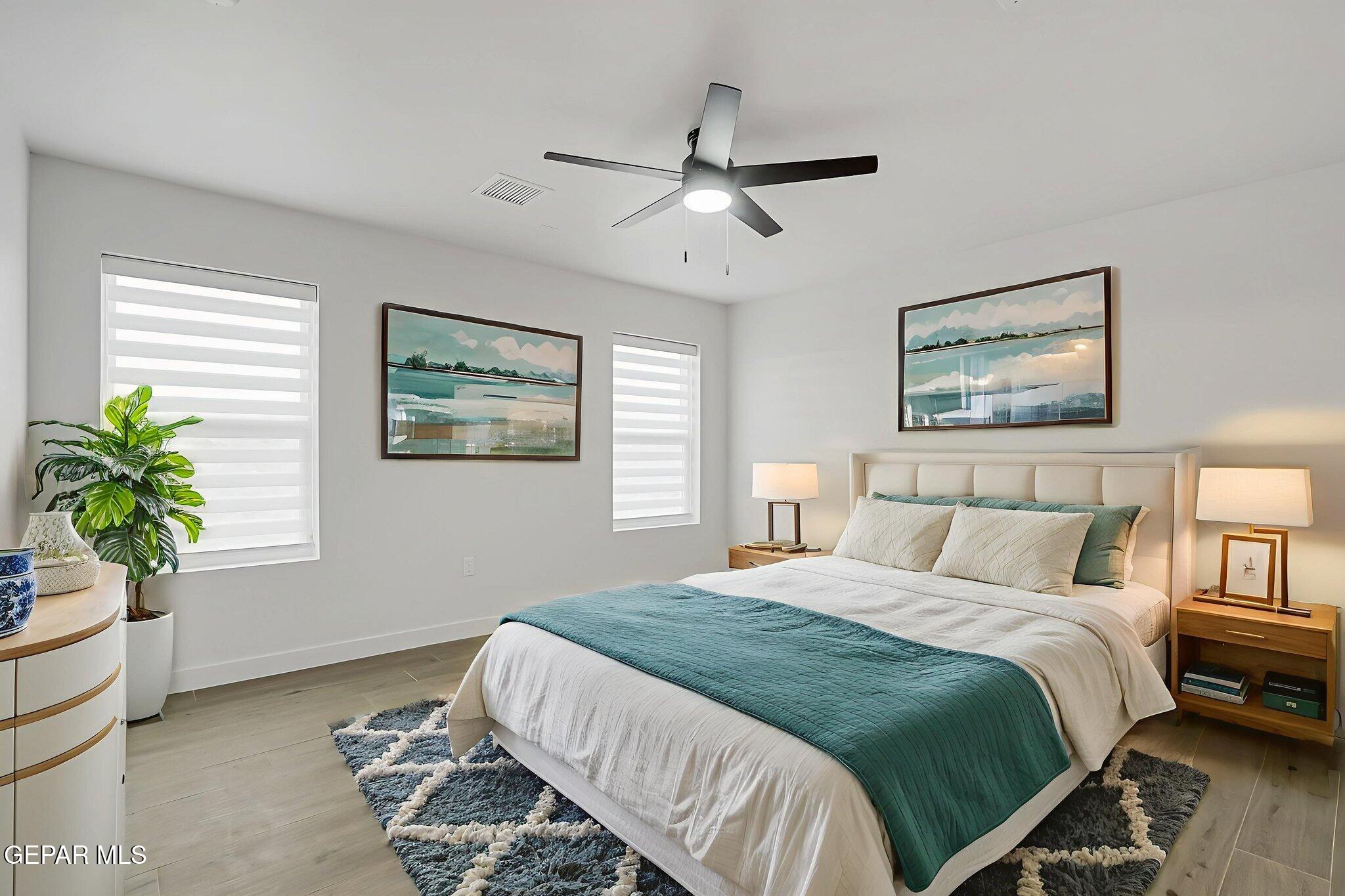 5981 Ruidoso Downs Street El Paso, TX 79932 - Photo 17 of 35 a bedroom with a bed and a window