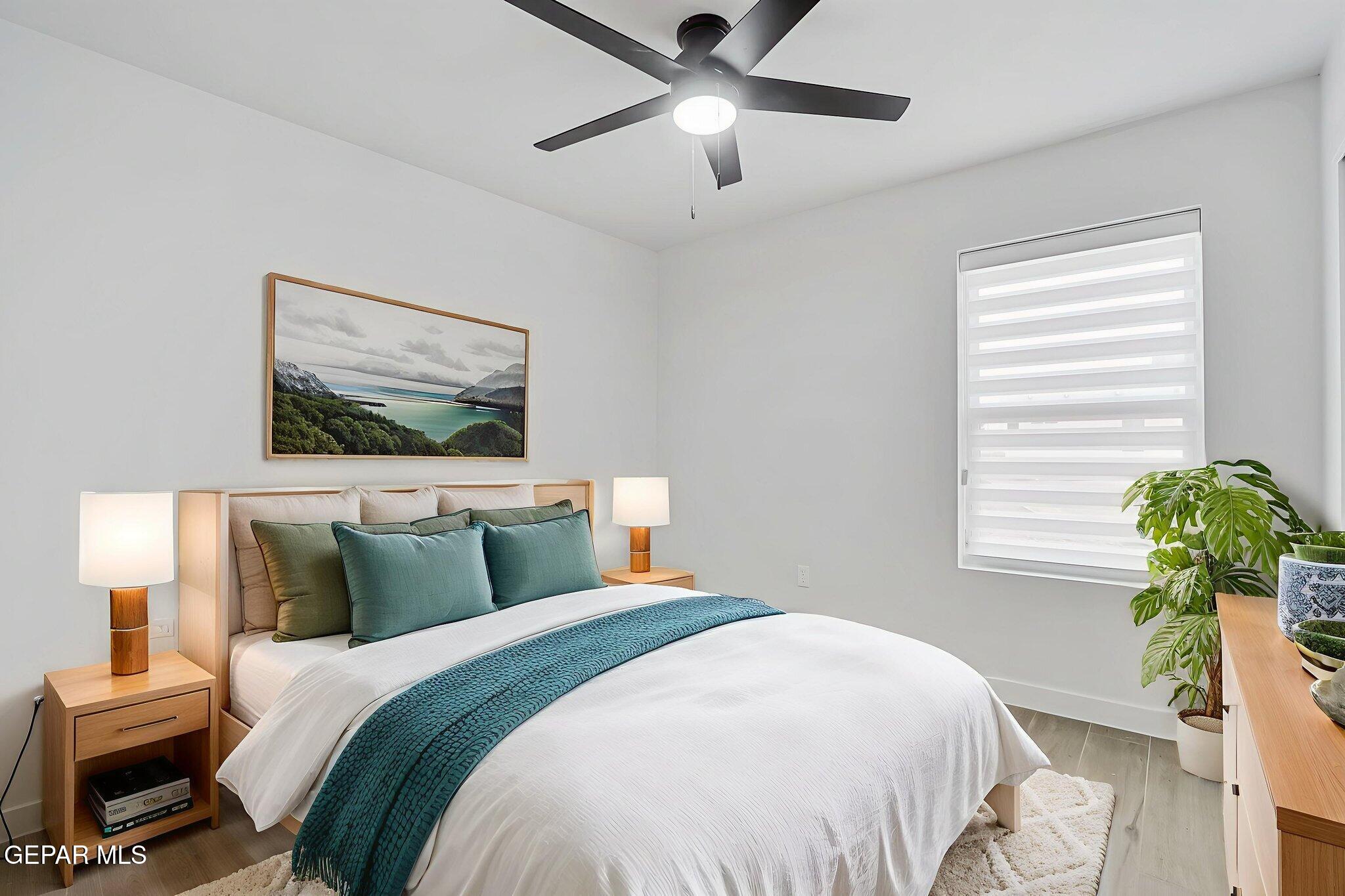 5981 Ruidoso Downs Street El Paso, TX 79932 - Photo 29 of 35 a bedroom with a bed and a window