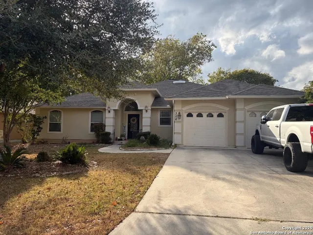 a view of a house with a patio