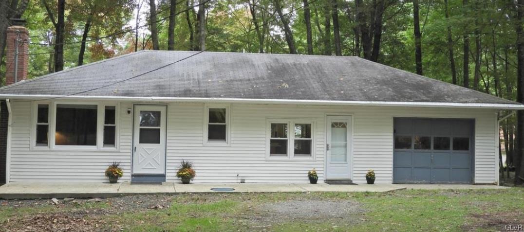 3110 Fern Road Pocono Summit, PA 18346 - Photo 2 of 20 a view of a house with a yard