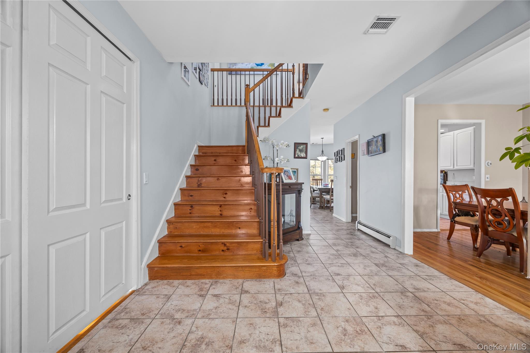 7 Bittersweet Lane Center Moriches, NY 11934 - Photo 8 of 32 a view of entryway and hall