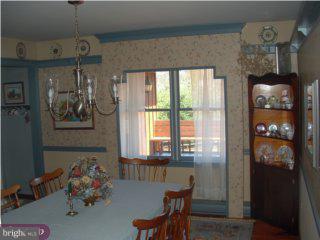 712 Fulmer Road Pottstown, PA 19465 - Photo 4 of 6 a bedroom with furniture and a window