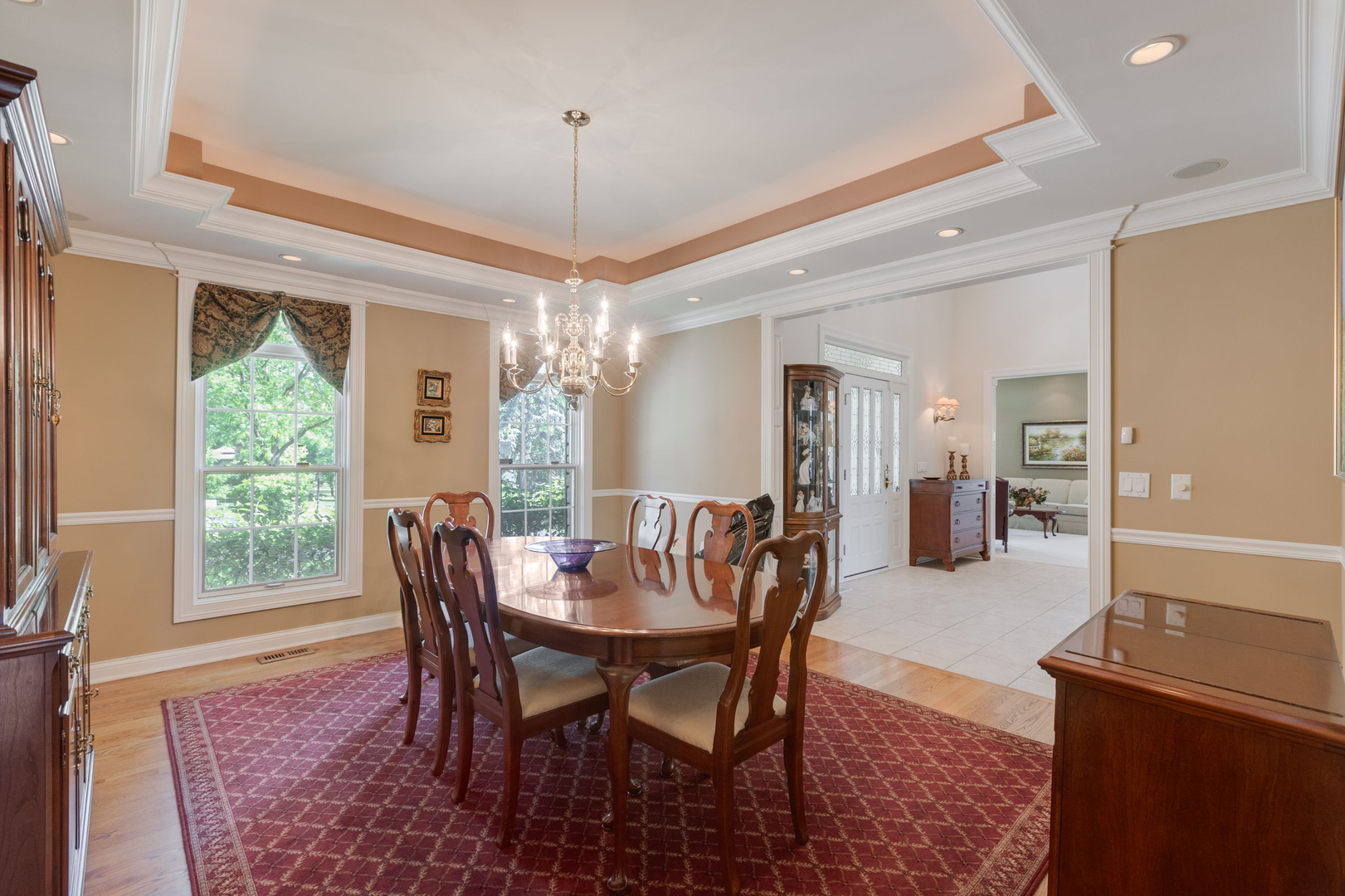 209 Carriage Trail Barrington, IL 60010 - Photo 7 of 42 a view of a dining room with furniture window and wooden floor