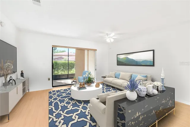 a living room with furniture and a table