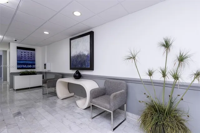 a room with gym equipment and windows