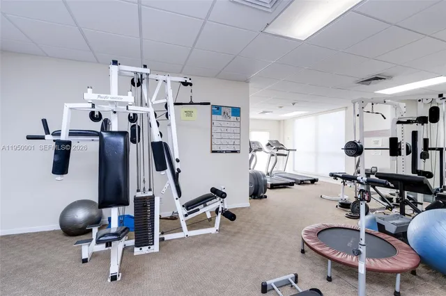 a bathroom with a sink a mirror and a toilet