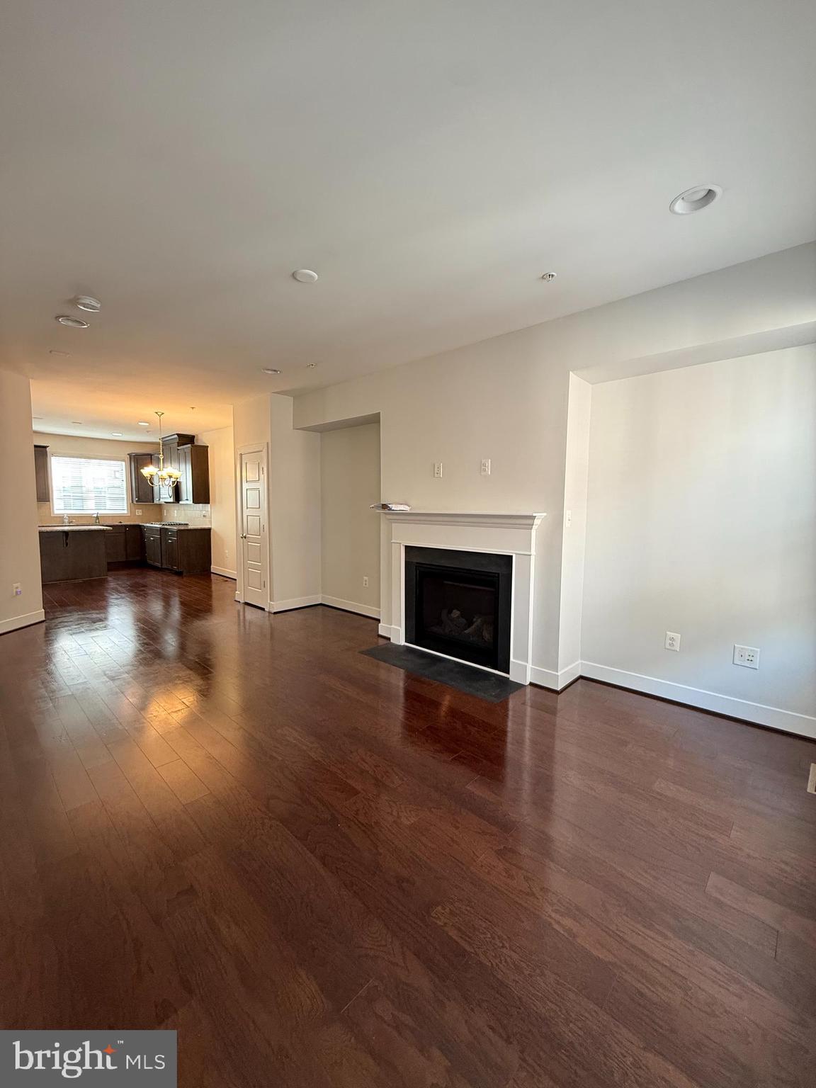 111 Kandinsky Loop Silver Spring, MD 20906 - Photo 4 of 16 a view of empty room with wooden floor