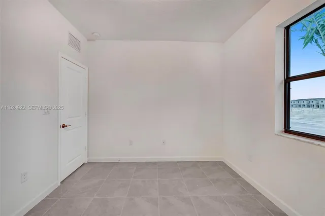 an empty room with closet