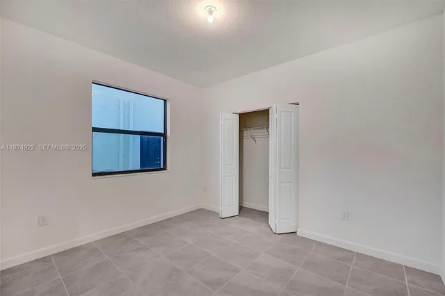 an empty room with closet