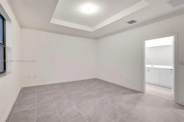 a bathroom with a sink toilet and vanity