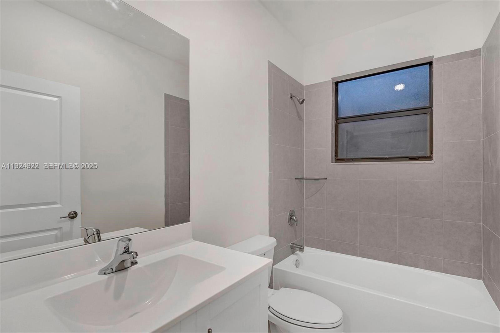 13405 Southwest 285th Street, Unit 13405 Homestead, FL 33033 - Photo 45 of 59 a bathroom with a sink toilet and bathtub