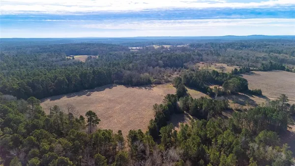 a view of a lake in middle of the town