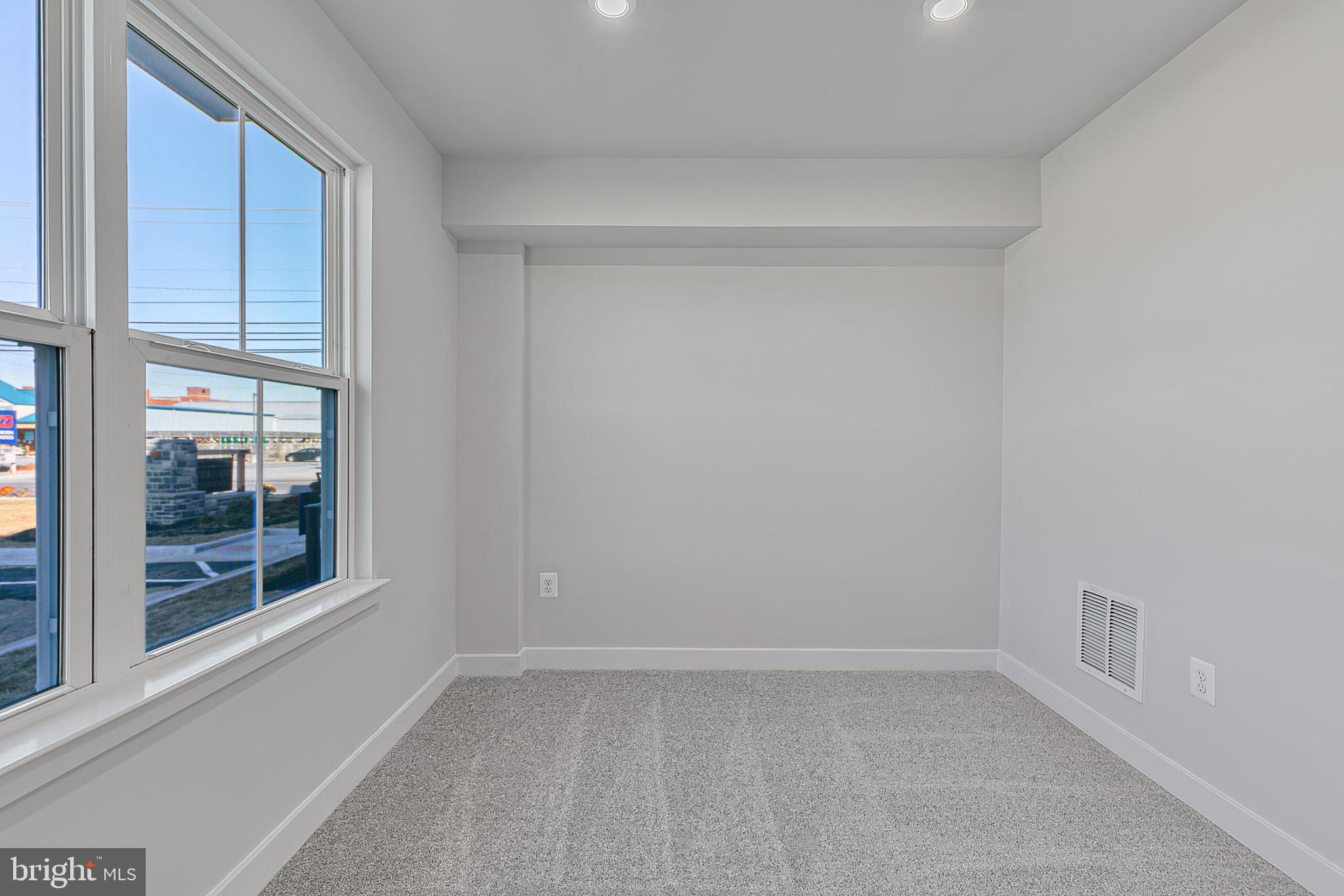 13 Oasis Avenue Ranson, WV 25438 - Photo 3 of 40 Finished Rec Room Space