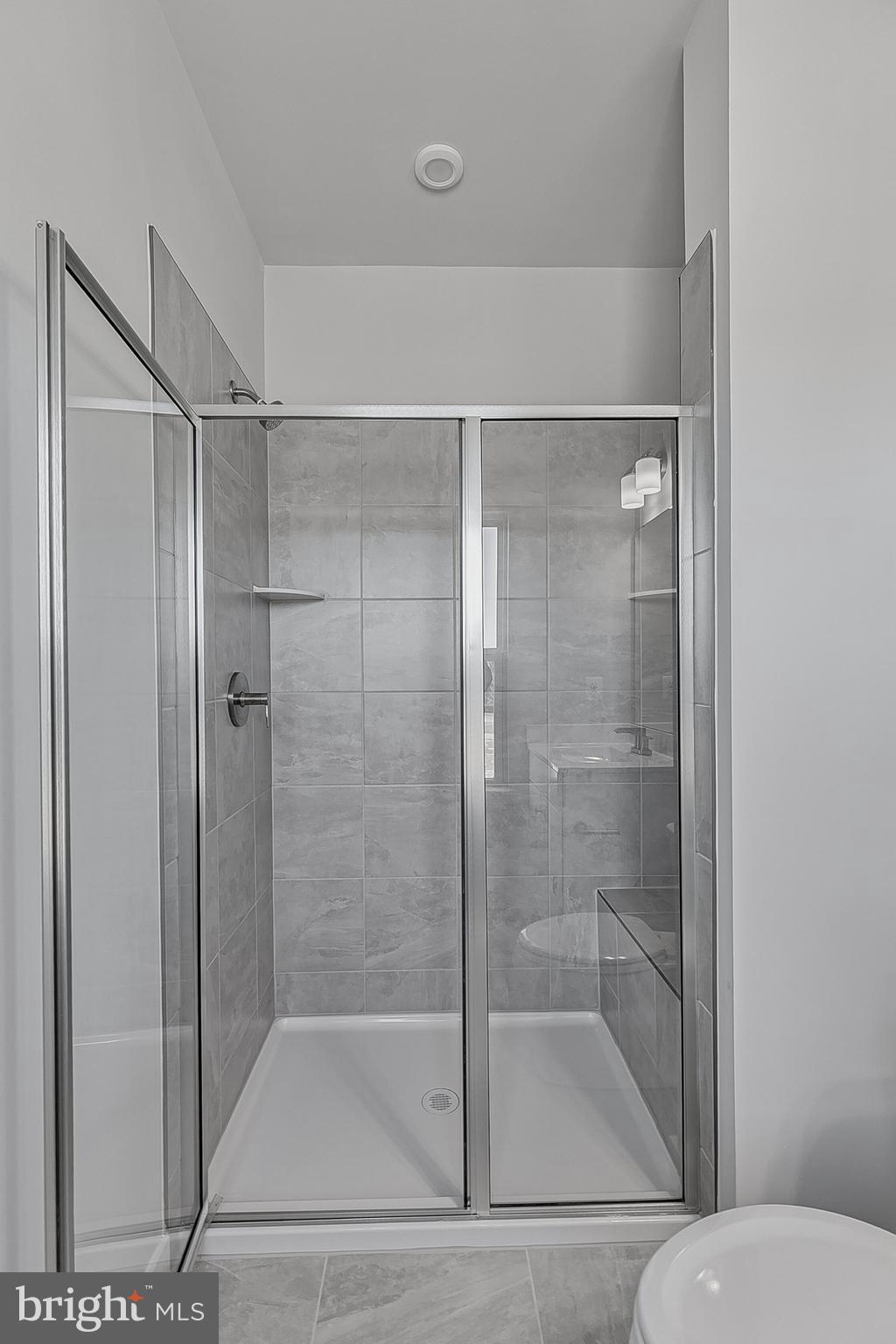 13 Oasis Avenue Ranson, WV 25438 - Photo 40 of 40 Primary Shower w/ Ceramic Surround