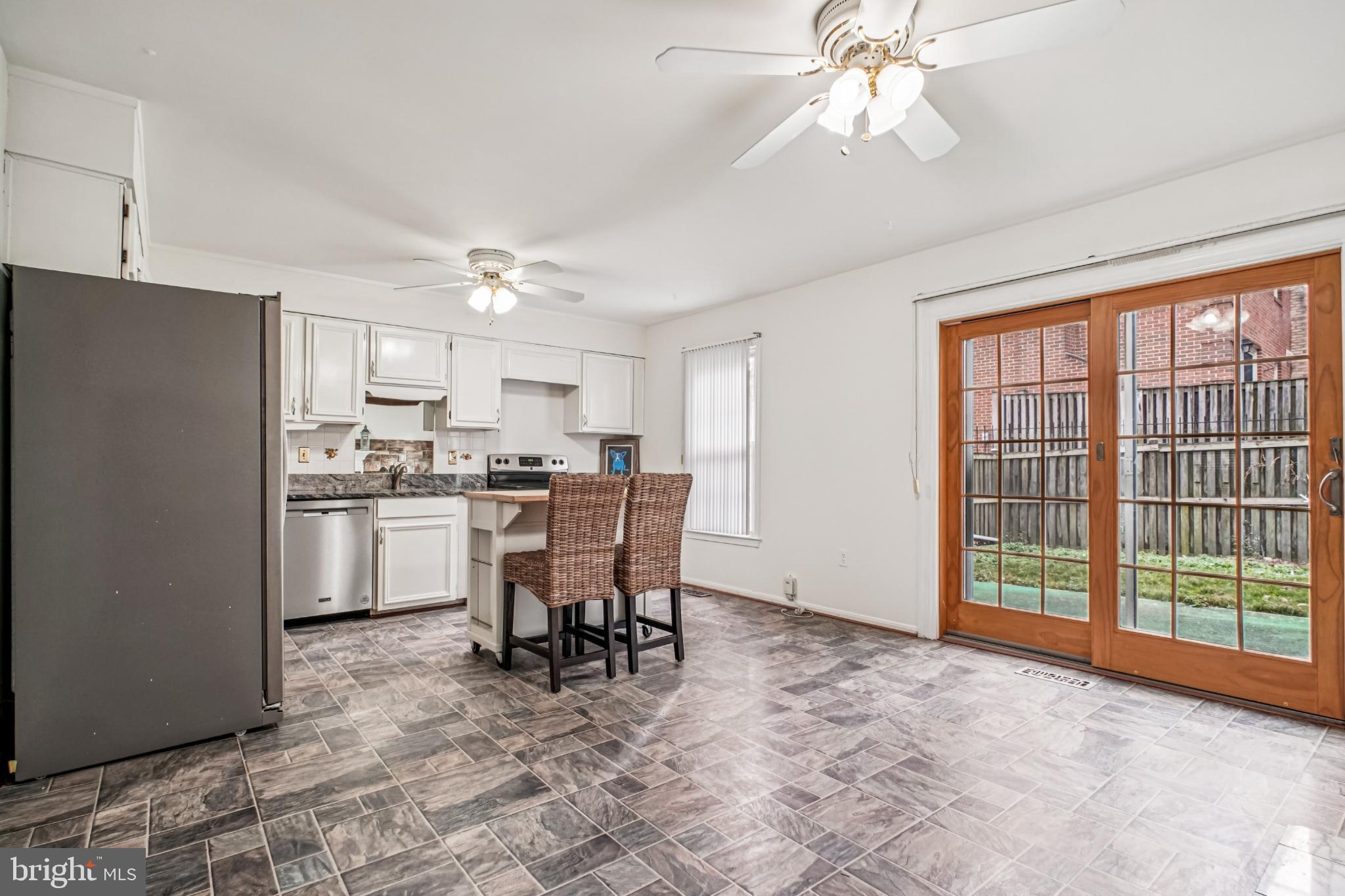 2201 McLean Park Road Falls Church, VA 22043 - Photo 14 of 40 Bright and inviting kitchen with outdoor access.
