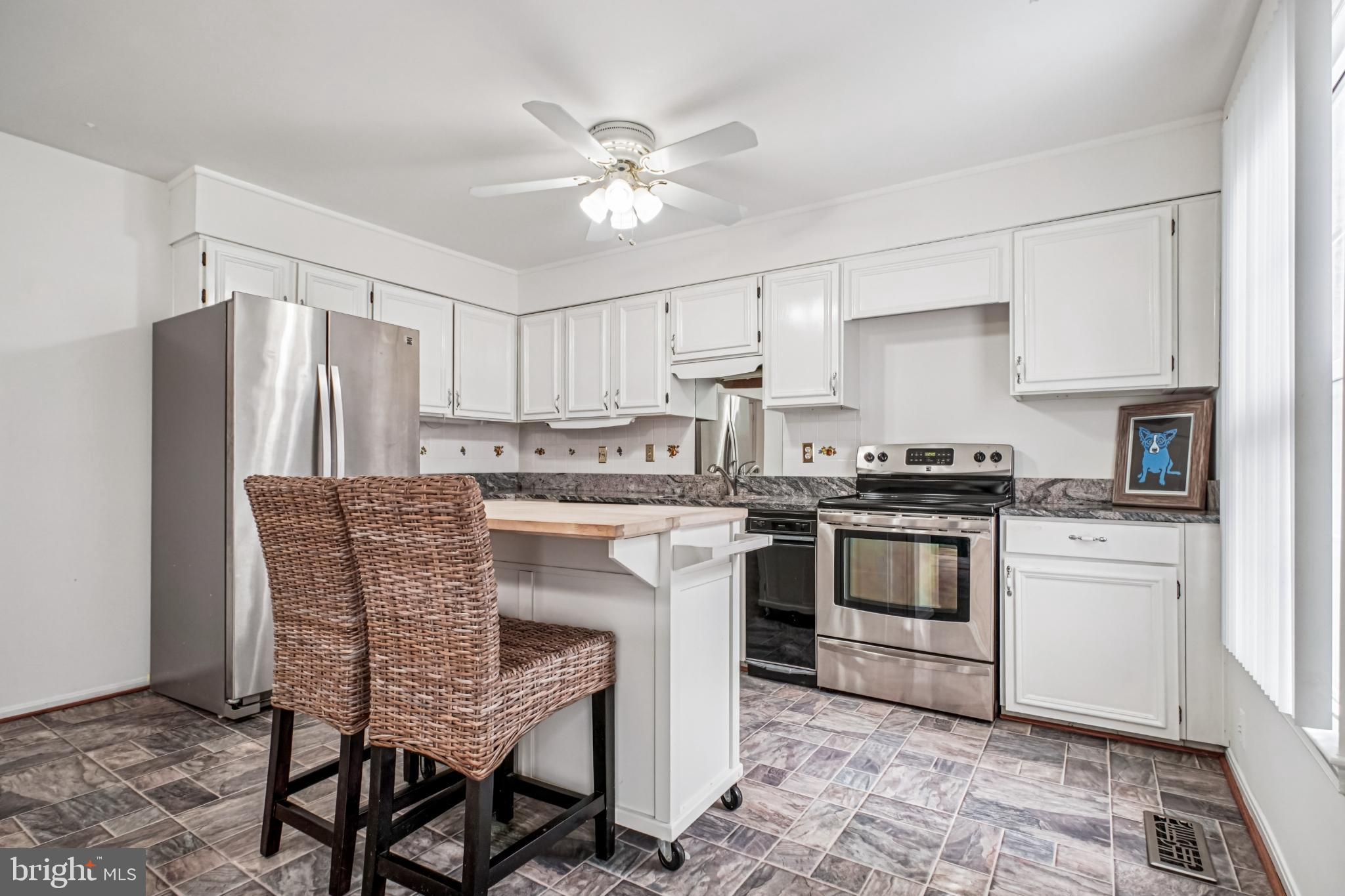 2201 McLean Park Road Falls Church, VA 22043 - Photo 15 of 40 Bright and inviting modern kitchen space.