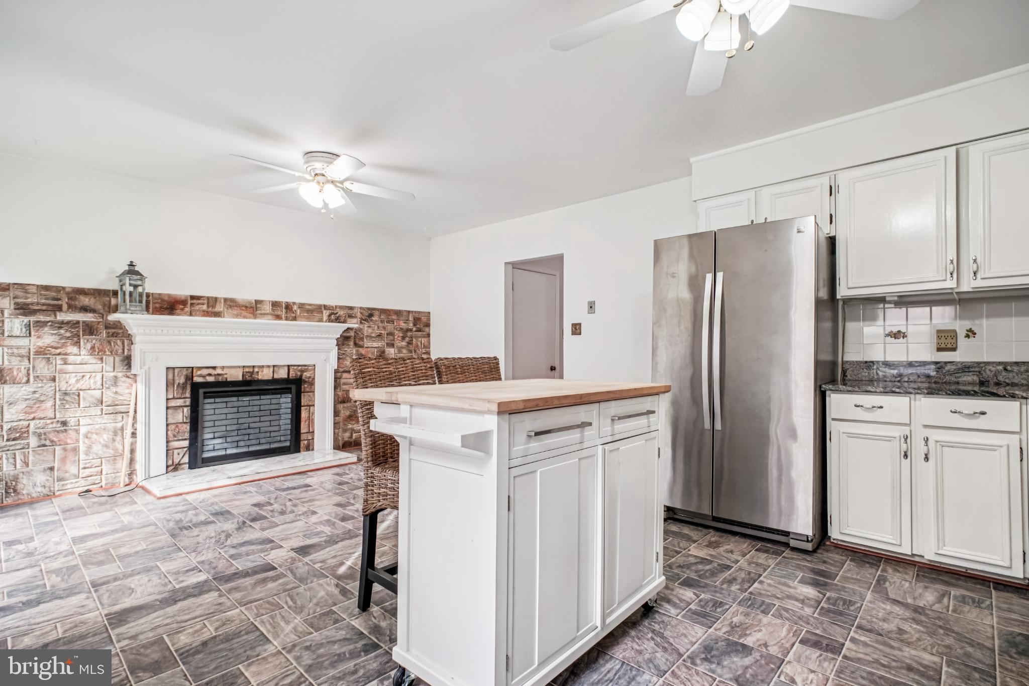 2201 McLean Park Road Falls Church, VA 22043 - Photo 16 of 40 Modern kitchen with stylish stone accents.