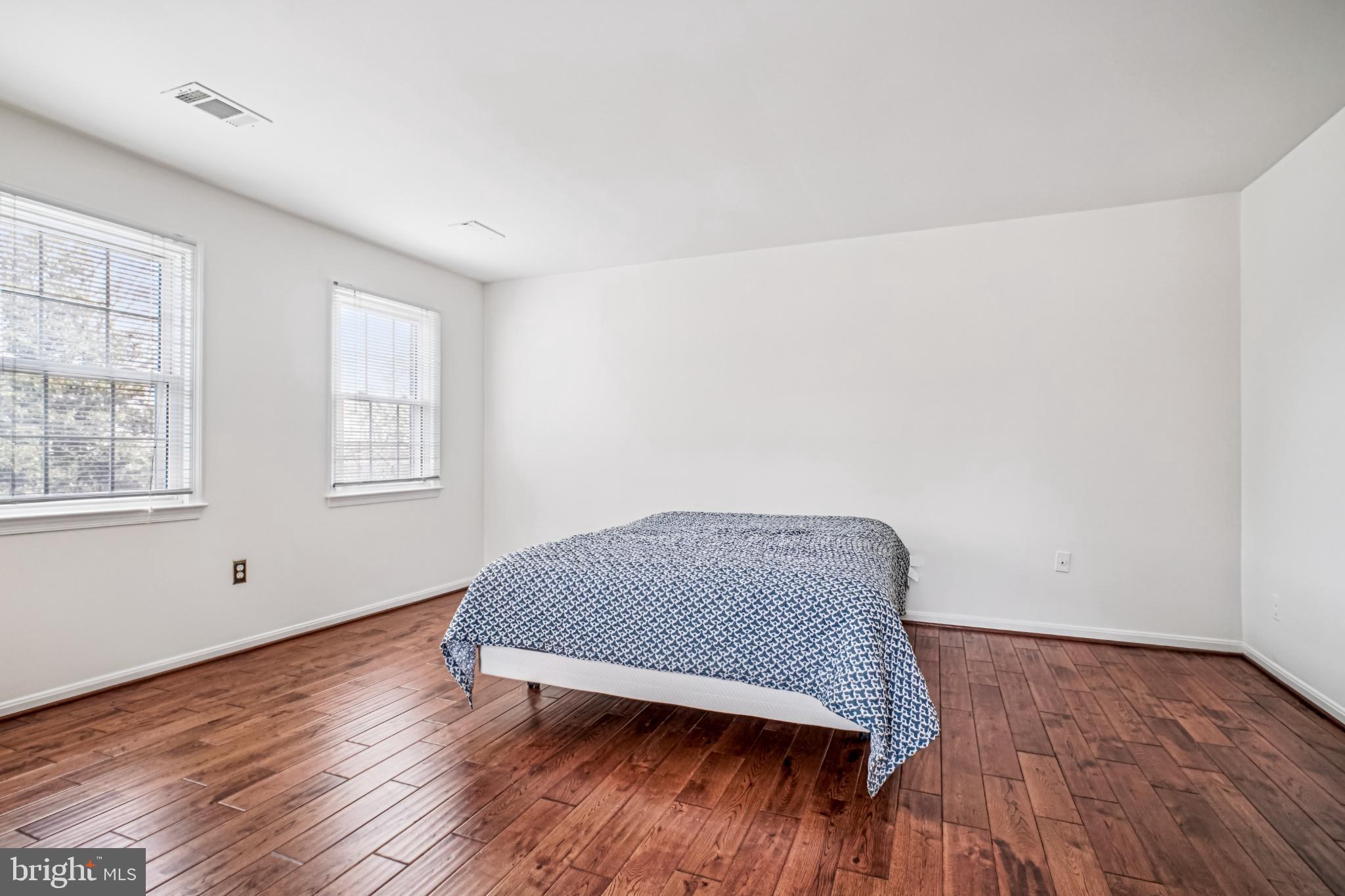 2201 McLean Park Road Falls Church, VA 22043 - Photo 21 of 40 Primary bedroom with hardwood floors.