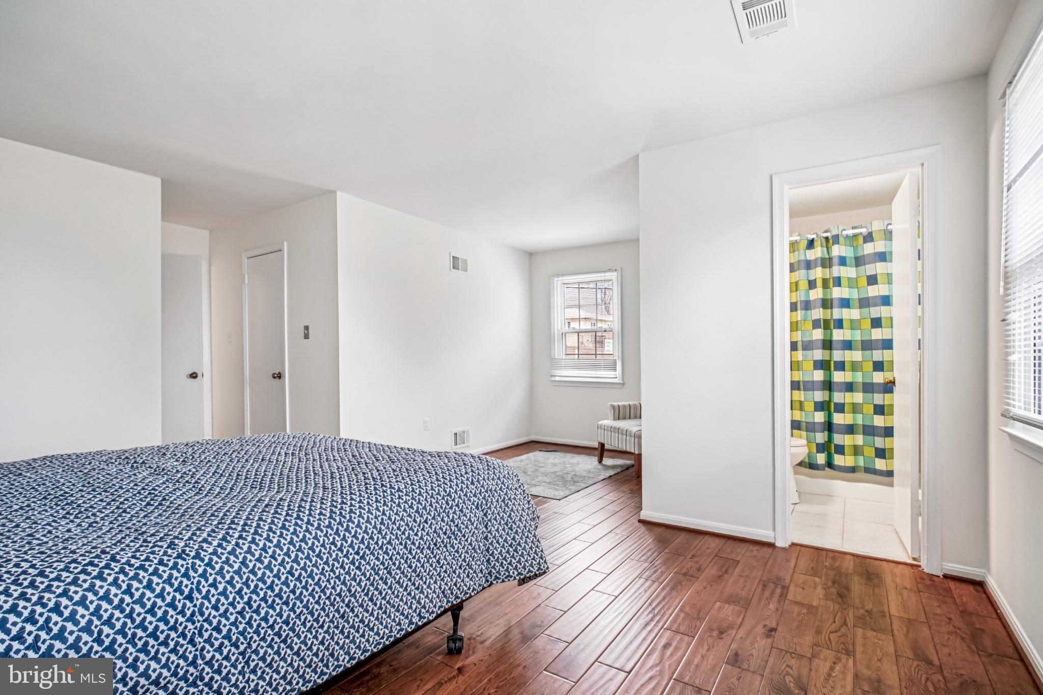 2201 McLean Park Road Falls Church, VA 22043 - Photo 22 of 40 Primary bedroom with modern charm.