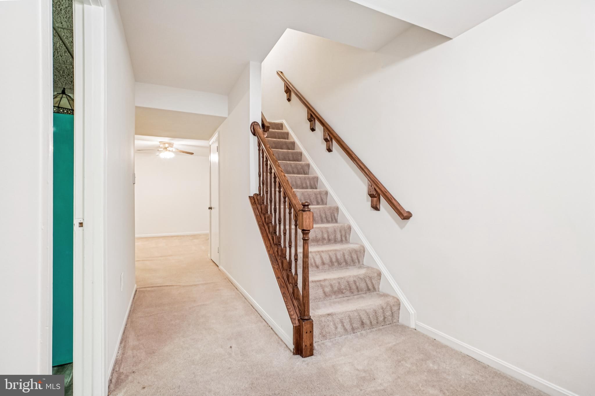 2201 McLean Park Road Falls Church, VA 22043 - Photo 32 of 40 Inviting staircase in a bright hallway.