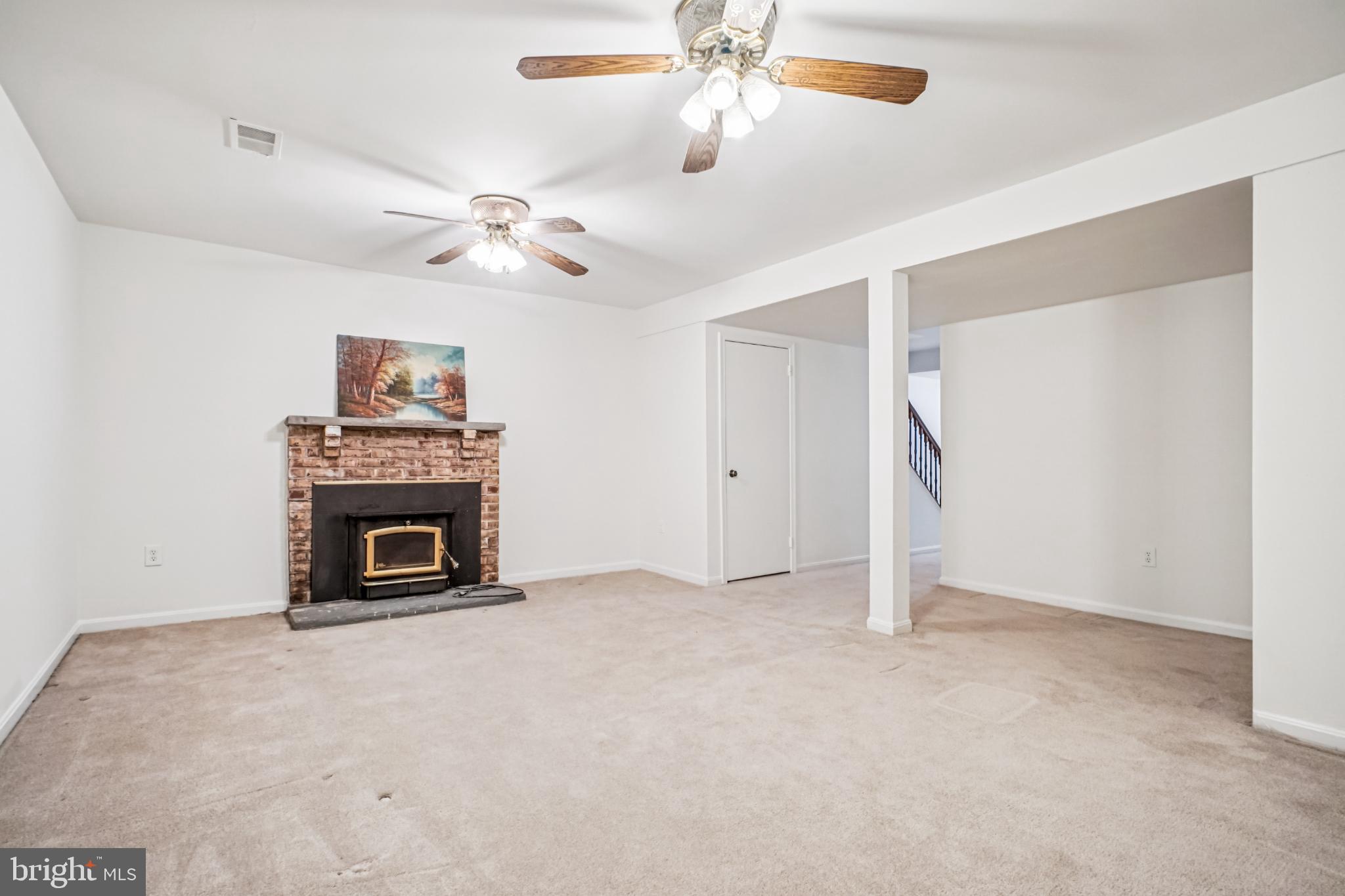 2201 McLean Park Road Falls Church, VA 22043 - Photo 33 of 40 Lower Level Rec Rm with cozy fireplace.