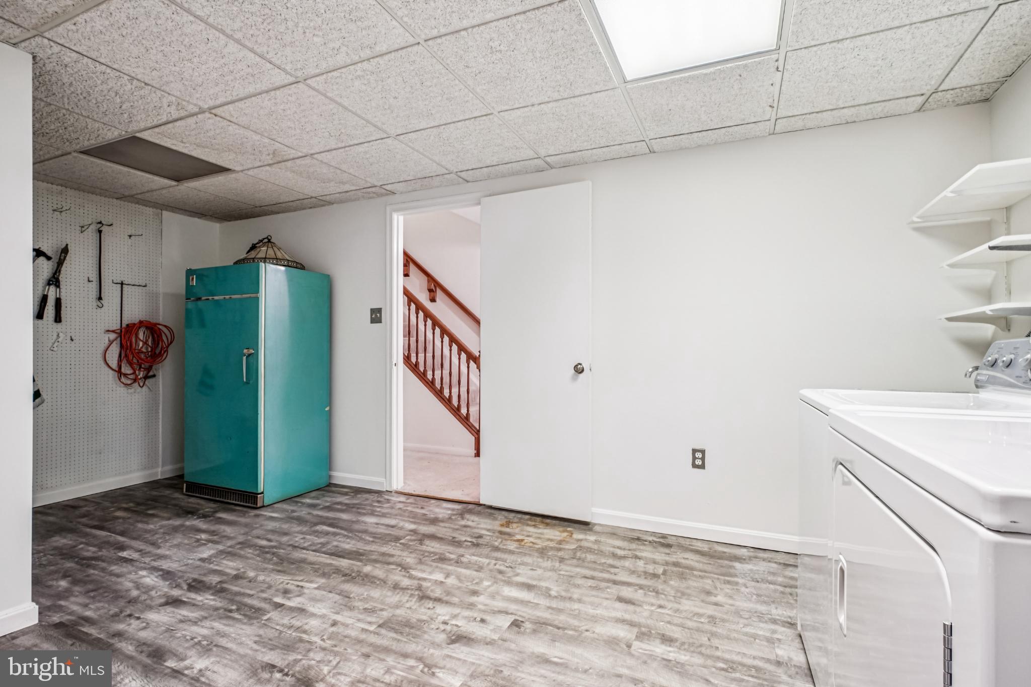 2201 McLean Park Road Falls Church, VA 22043 - Photo 37 of 40 Bright and spacious laundry area with charm.